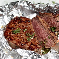 How Long Can Cooked Steak Sit Out: Understanding Food Safety